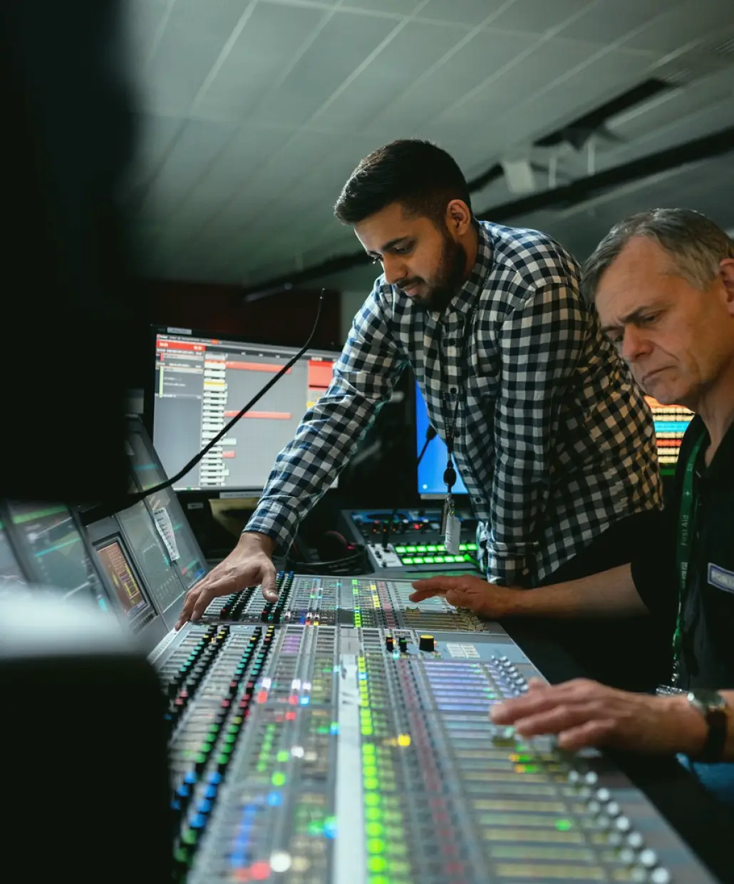 Warm skin tones under cold LEDs: one news desk, one fix
